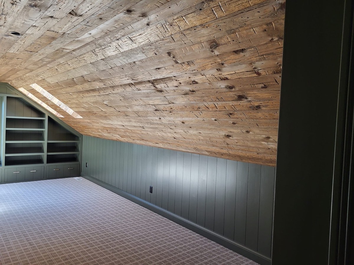 Custom ceiling with beam and board detailing